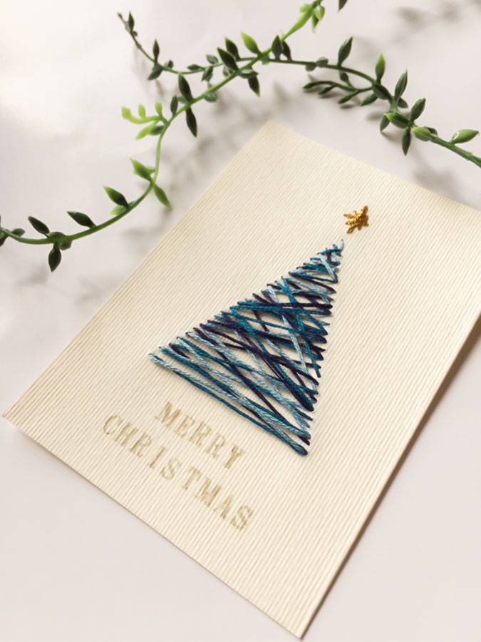 Una postal de Navidad bordada.