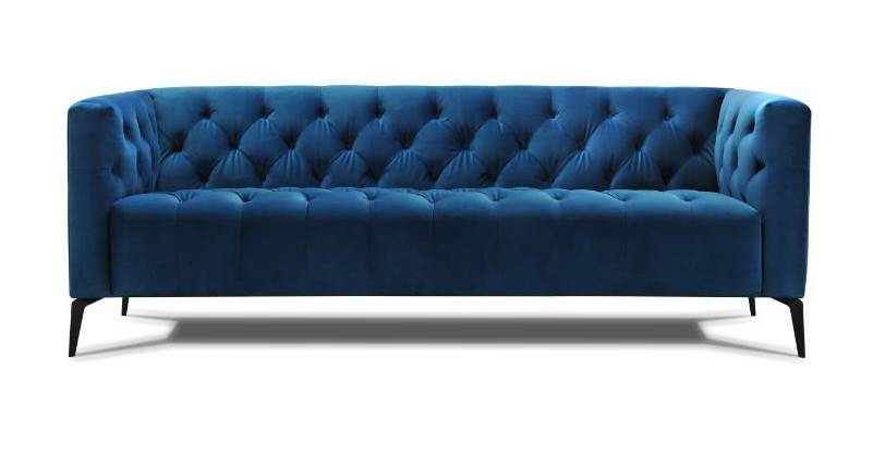 Un sofá de terciopelo en azul petróleo