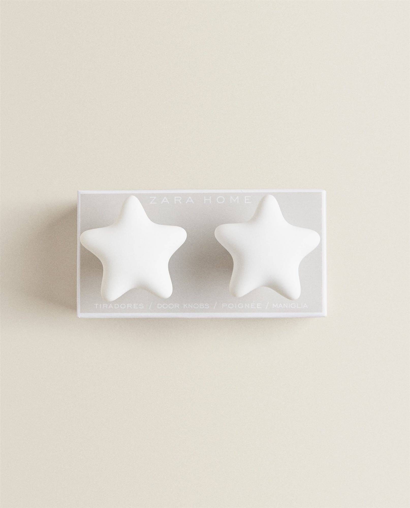 Tiradores con forma de estrella en color blanco
