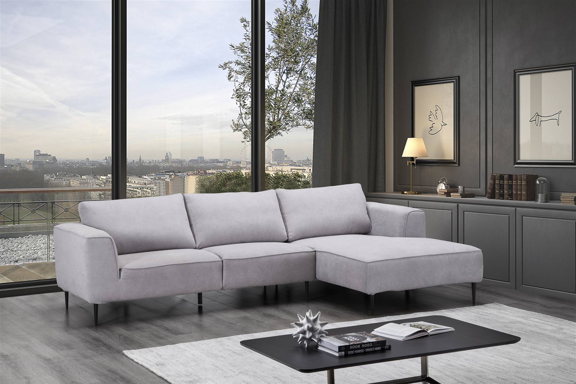 Un sofá chaise longue en color gris