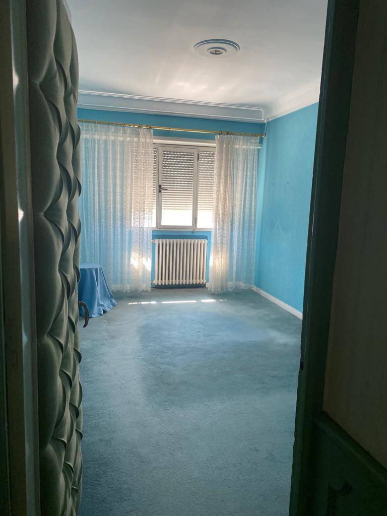 Antes: un dormitorio en tonos azules 