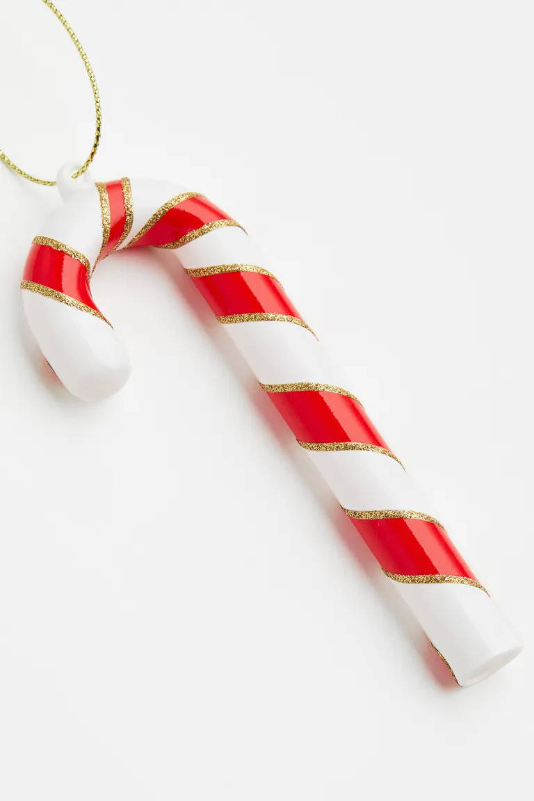 Adorno de navidad con forma de bastón de caramelo H&M Home.