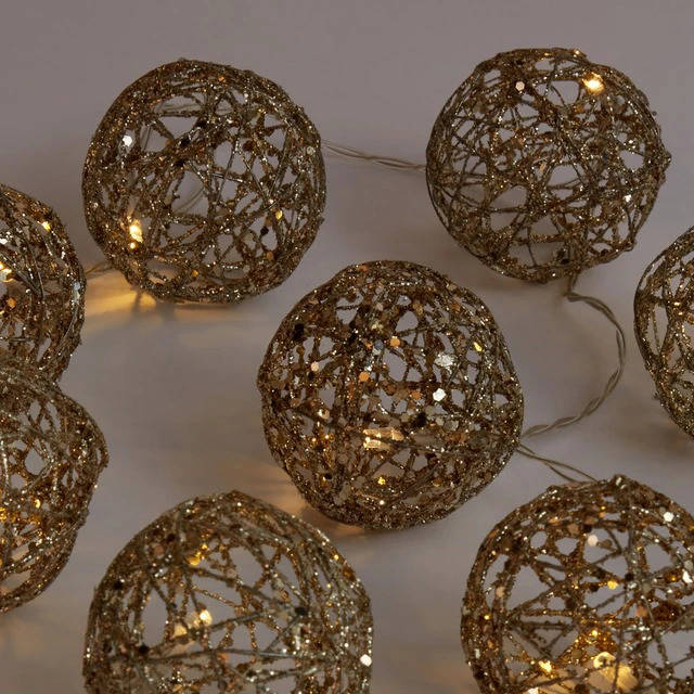 Guirnalda de bolas glitter con luz de El Corte Inglés. 