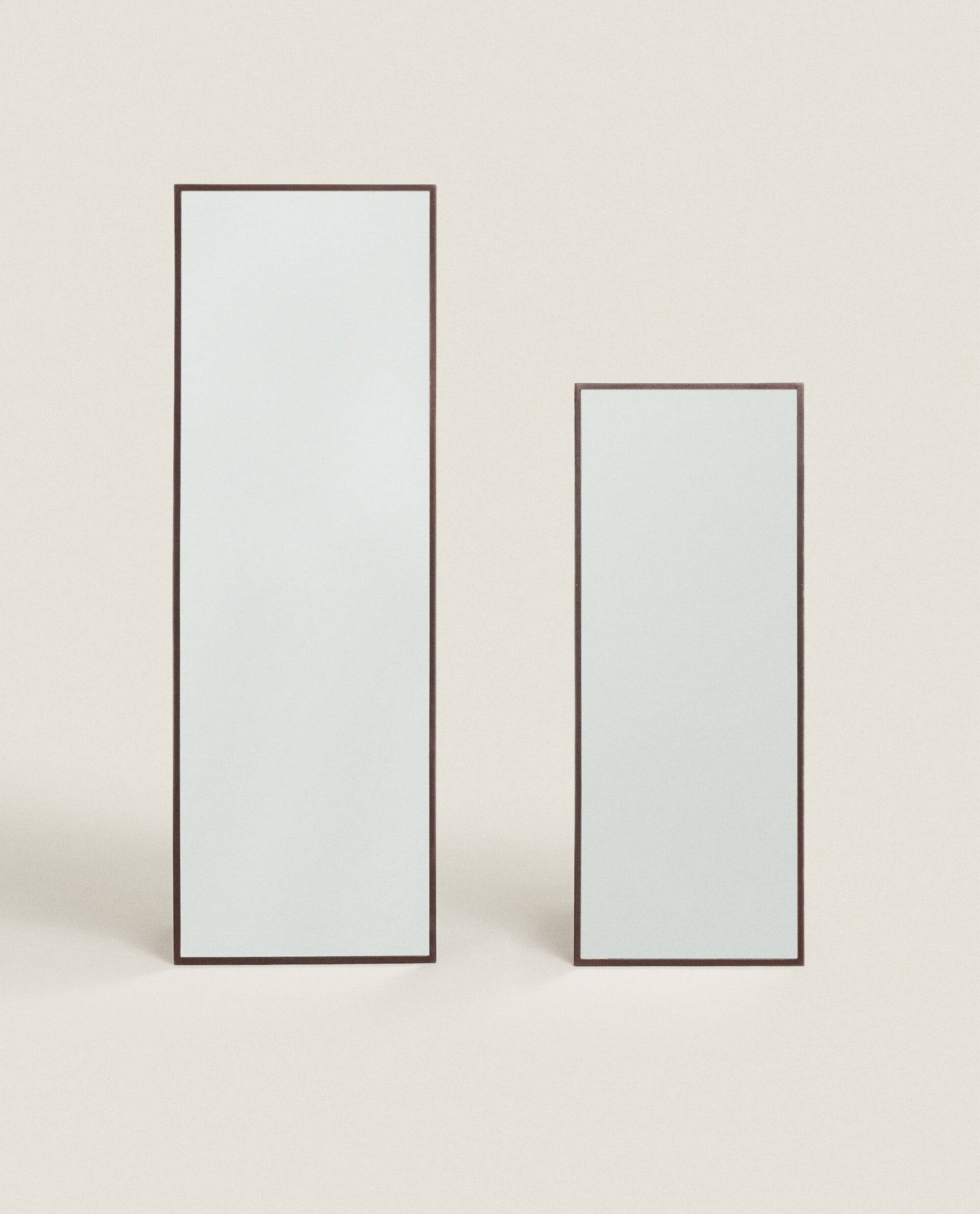 Espejos rectangulares con marco de metal en color negro de Zara Home