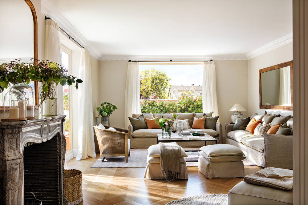 Reformas de pisos: salón con terraza integrada