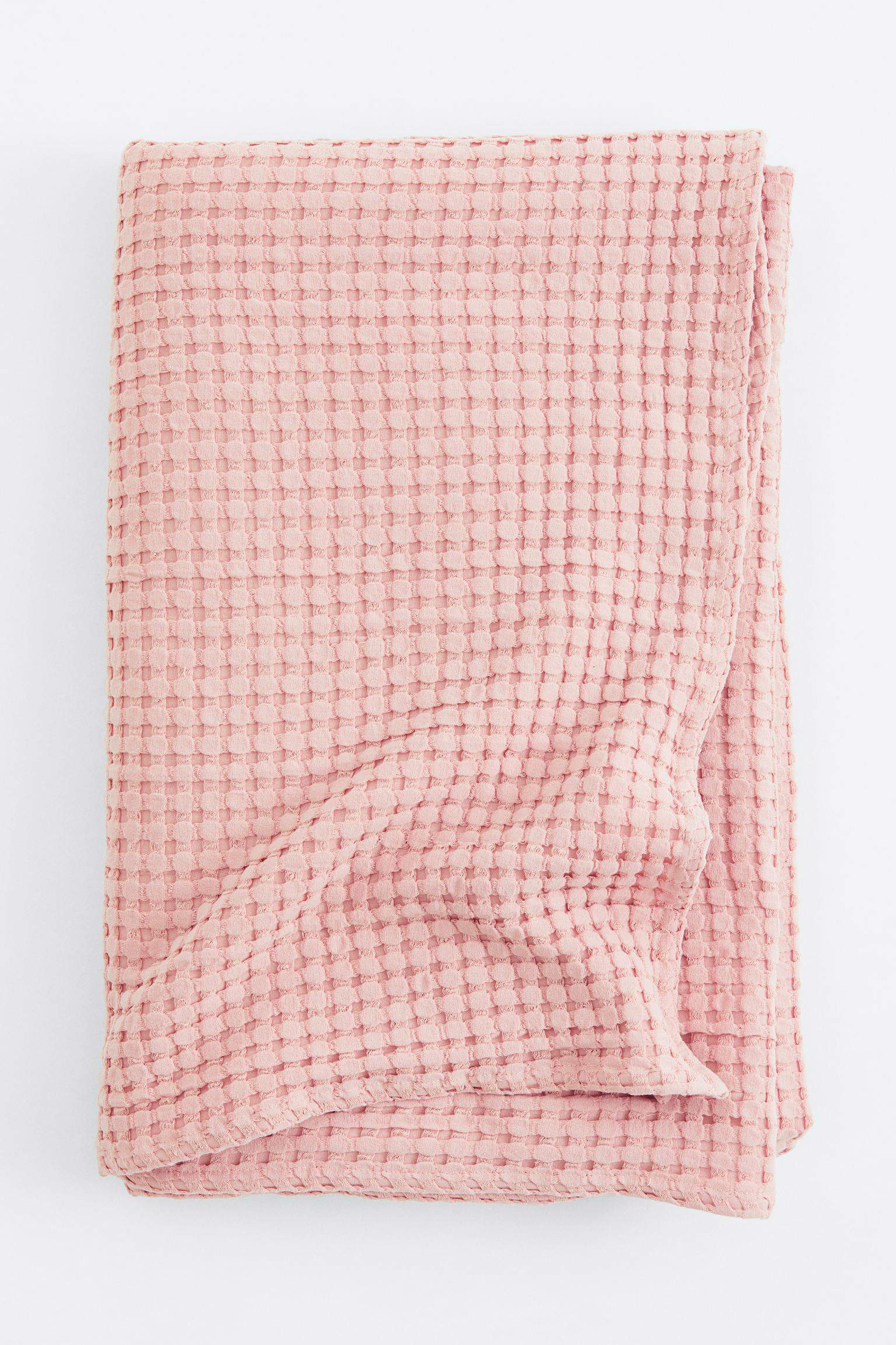 Manta rosa con textura 'waffle'