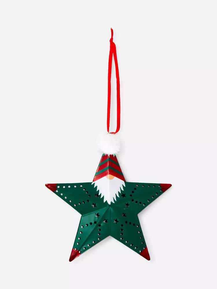 Adorno árbol de Navidad, gnomo y estrella de Primark.