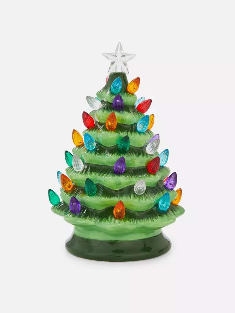 Árbol de Navidad de cerámica con luces LED.